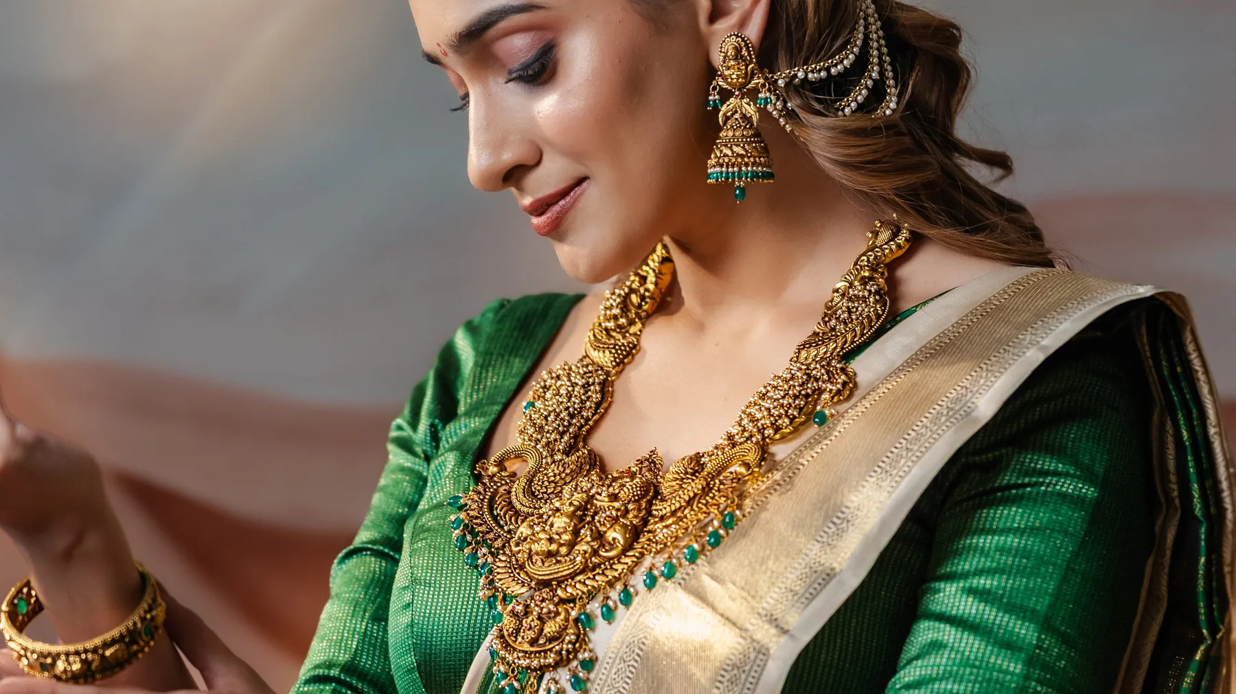 Close view of the Lakshmi haram and a pearl-draped jhumka